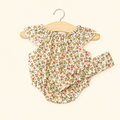Pagliaccetto Clara con Fascia Petites Fleurs Fushia – Minikane